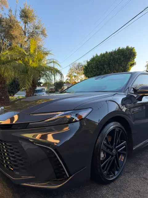 Black Toyota Crown with mirror finish after detail