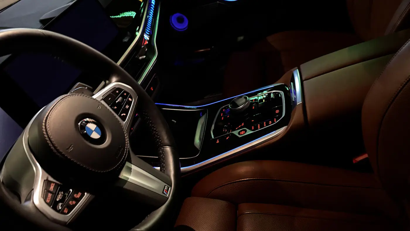 Freshly detailed luxury car interior with ambient lighting
