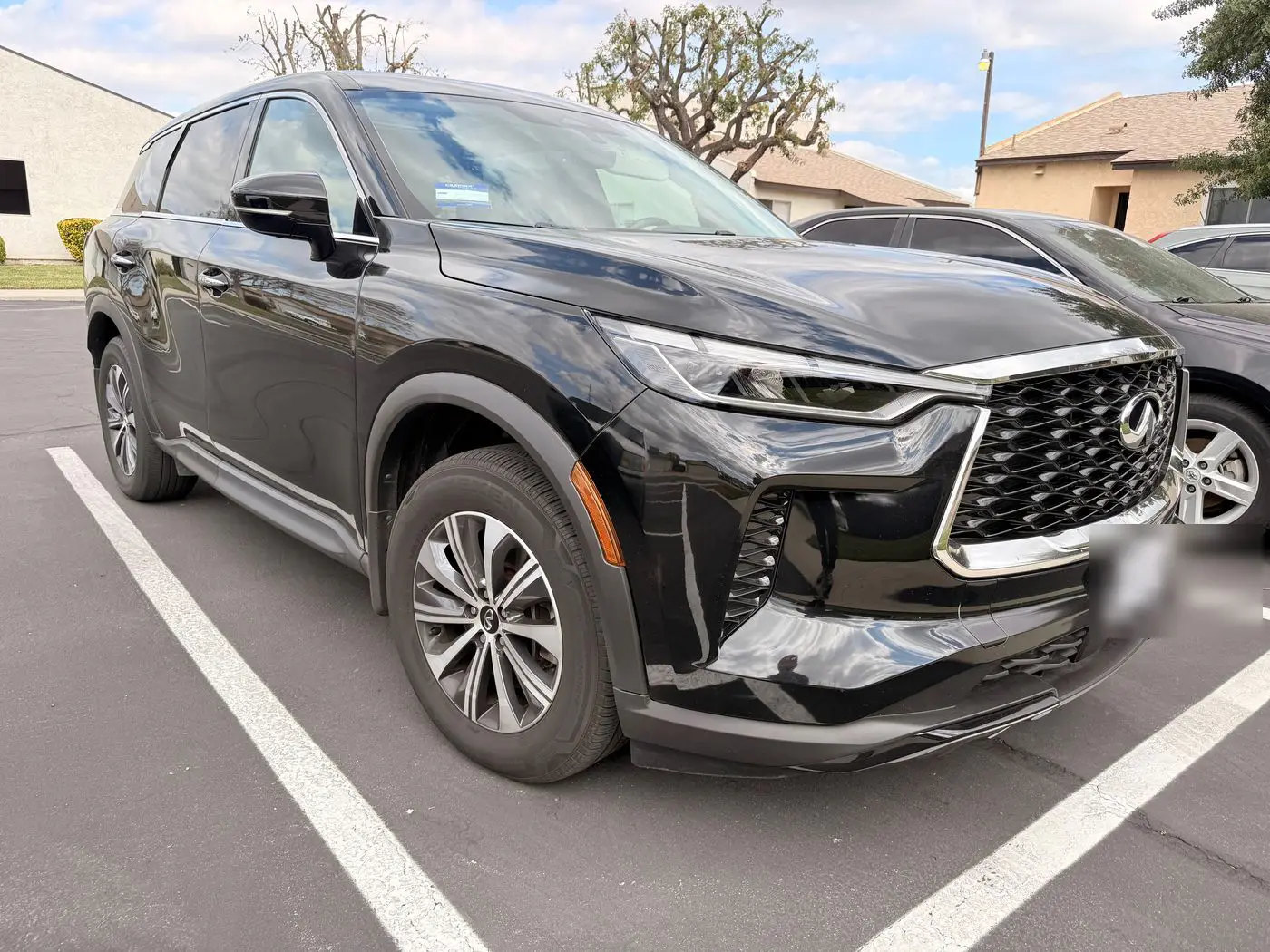 Black Infiniti QX80 SUV detailed to a deep shine
