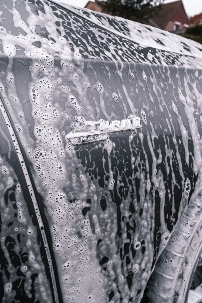 Car covered in detailing foam