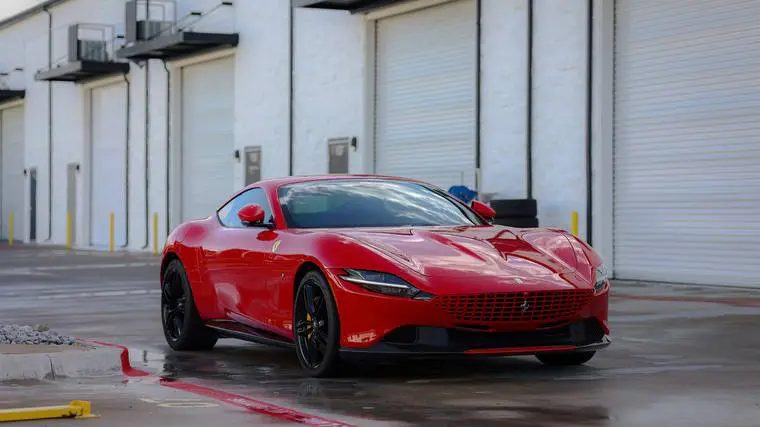 Red Ferrari Roma paint protection film — front three quarter at Humble Crew Auto Spa, Plano TX