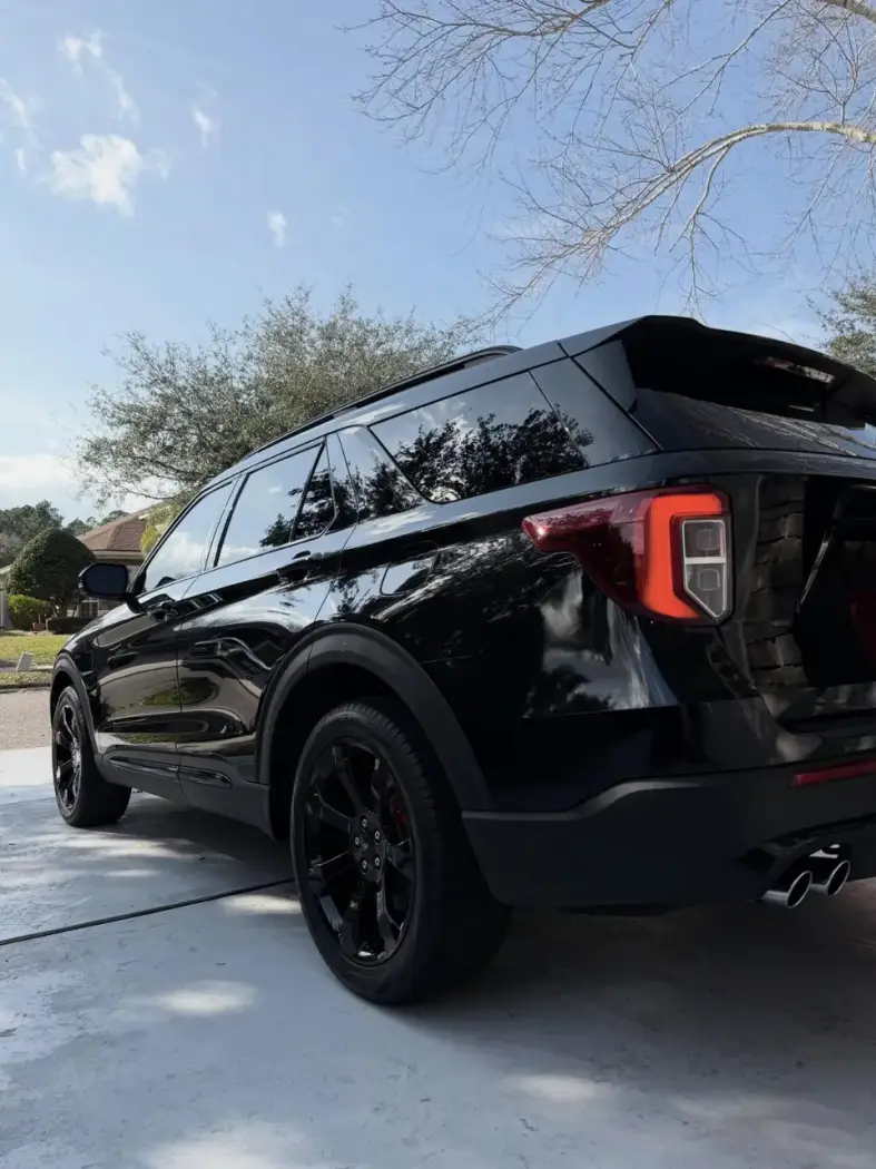 All-black Ford Explorer ST with glossy paint after a full detail
